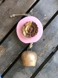 Carved  wood rose on Pink log