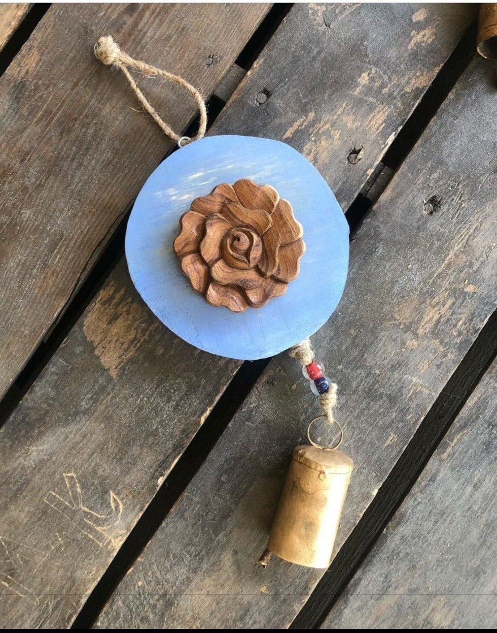 Carved  wood rose on Light Blue log